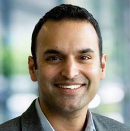 A close-up of a person smiling

AI-generated content may be incorrect.
